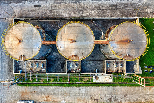 Drone view of storage tanks for oil products located in industrial refinery factory