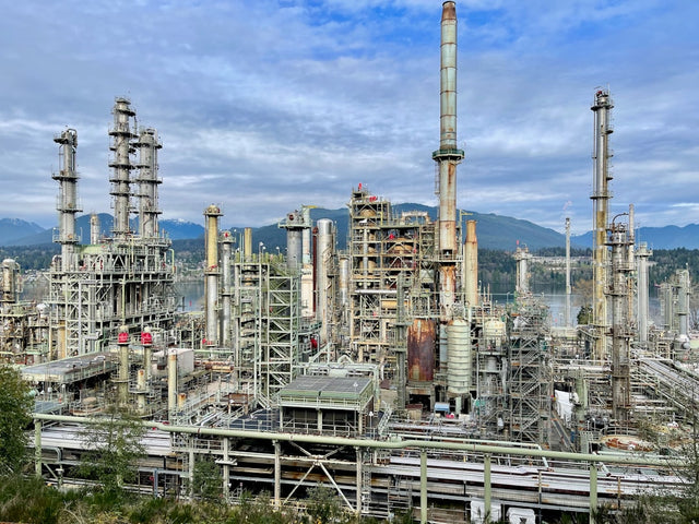 A large industrial area with a lot of tall buildings