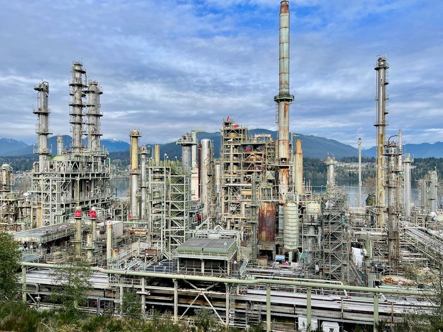 A large industrial area with a lot of tall buildings