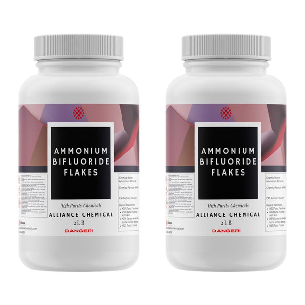 Two 2 L bottles of Alliance Chemical Ammonium Bifluoride Flakes with white screw cap lids and product labels.