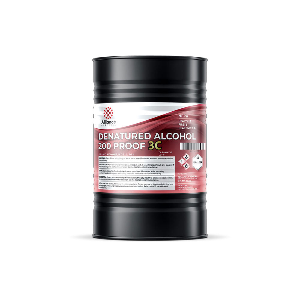 55-gallon black drum of Alliance Chemical 200-proof 3C denatured alcohol with NFPA diamond, flammable/health hazard symbols, and red label design.