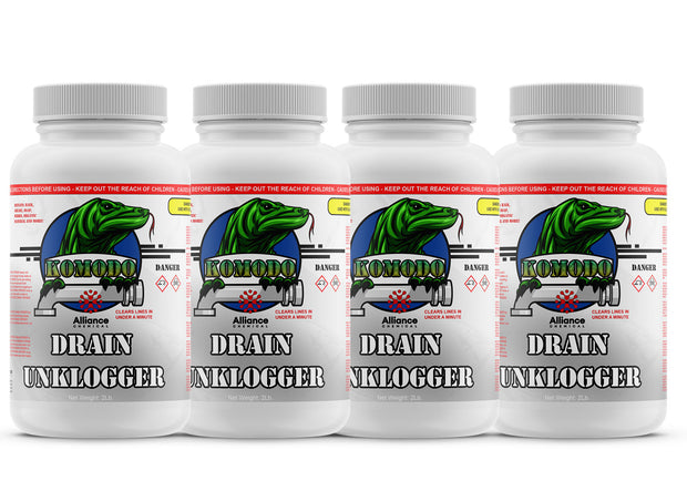 Four 2 lb plastic bottles of Alliance Chemical Komodo Drain Unklogger with white ribbed caps and labeled graphics.