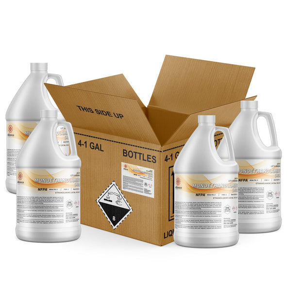 Four 1-gallon HDPE jugs of Alliance Chemical Monoethanolamine with handles and safety labels, inside a cardboard box.