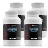 Alliance Chemical 2lb bottles of ACS-grade Potassium Hydroxide, HDPE containers with black labels, hazard warnings, 4-pack