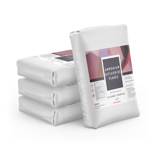 Four white bags of Alliance Chemical Ammonium Bifluoride Flakes with a product label and marked 55 LB.
