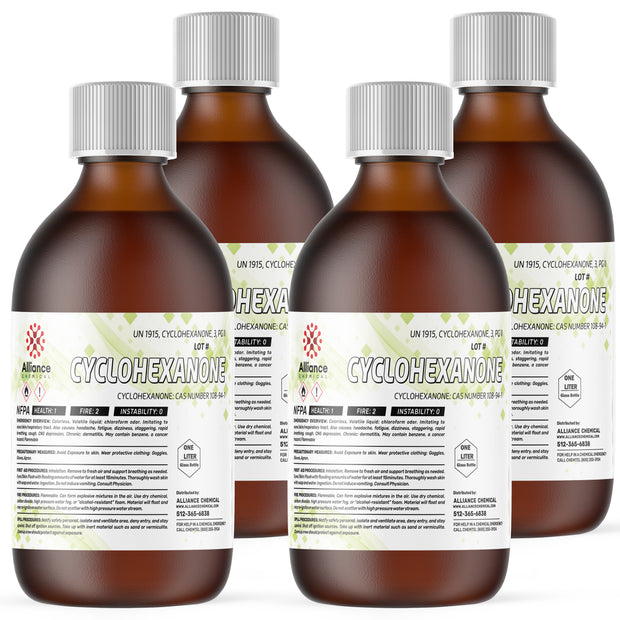 1-Liter amber glass bottles of ACS-grade Cyclohexanone with NFPA health/fire labels, and Alliance Chemical safety information