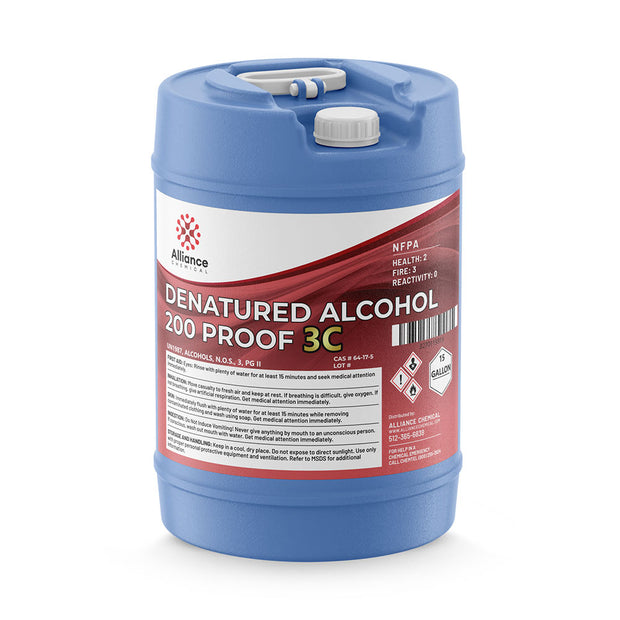 5-gallon HDPE carboy of Alliance Chemical 200-proof denatured alcohol 3C with NFPA diamond, hazard warnings and white screw