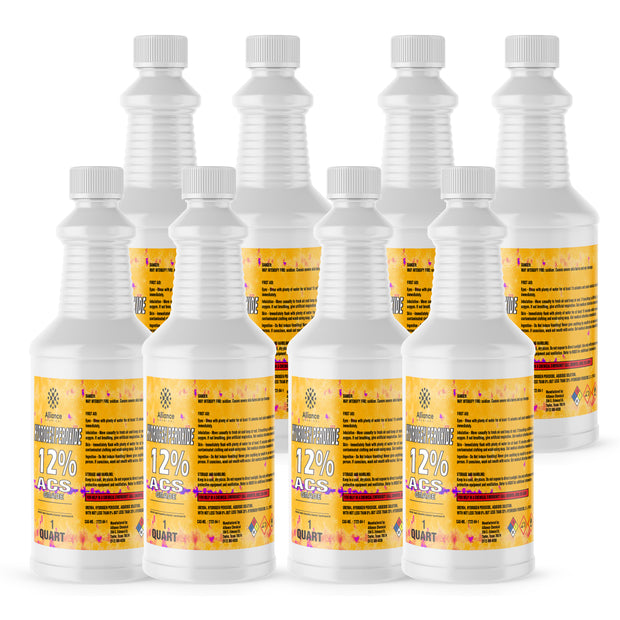 Seven 1-quart plastic bottles of Alliance Chemical Hydrogen Peroxide 12% ACS Grade with white caps and product labels