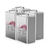 4-quart set of industrial xylene solvent in sealed metal safety cans with handles, hazard warning labels, and Alliance