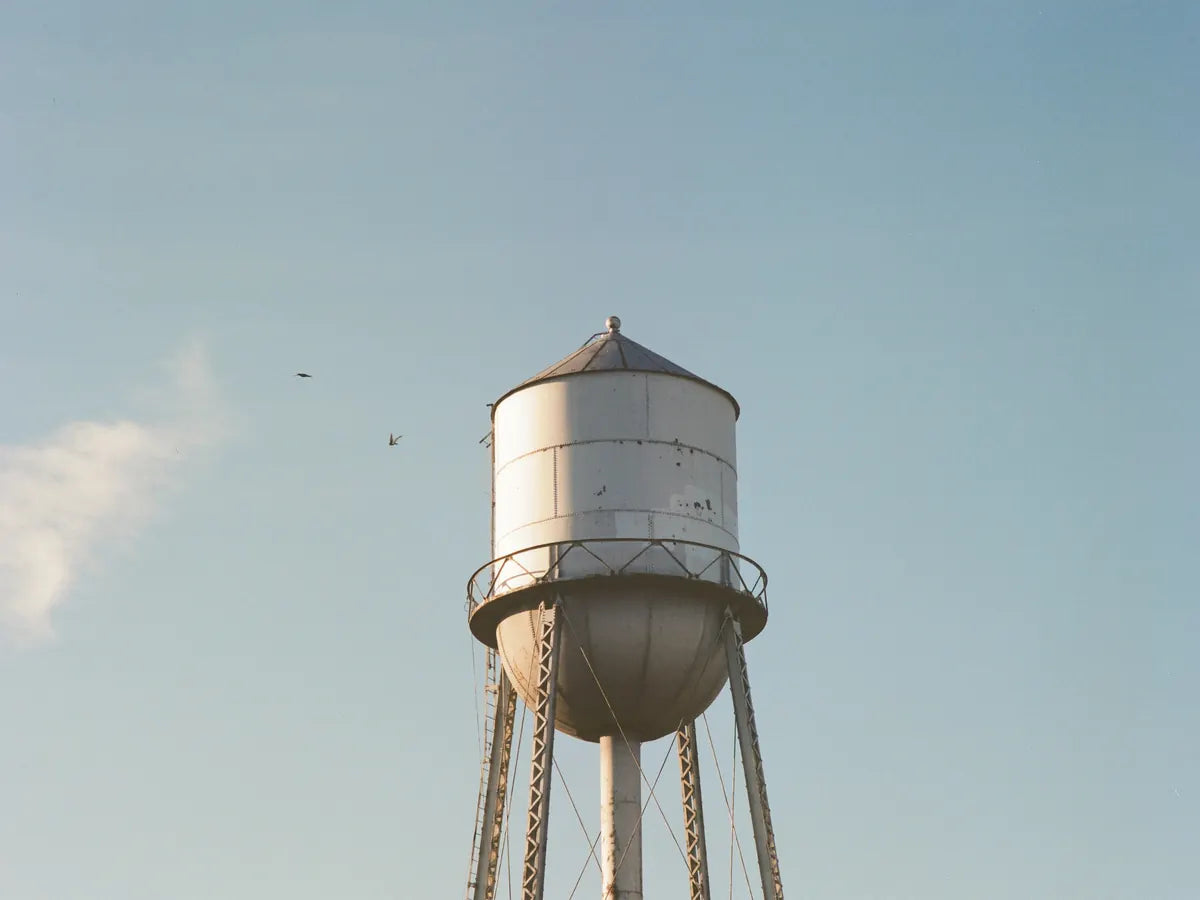 Water tower against the sky